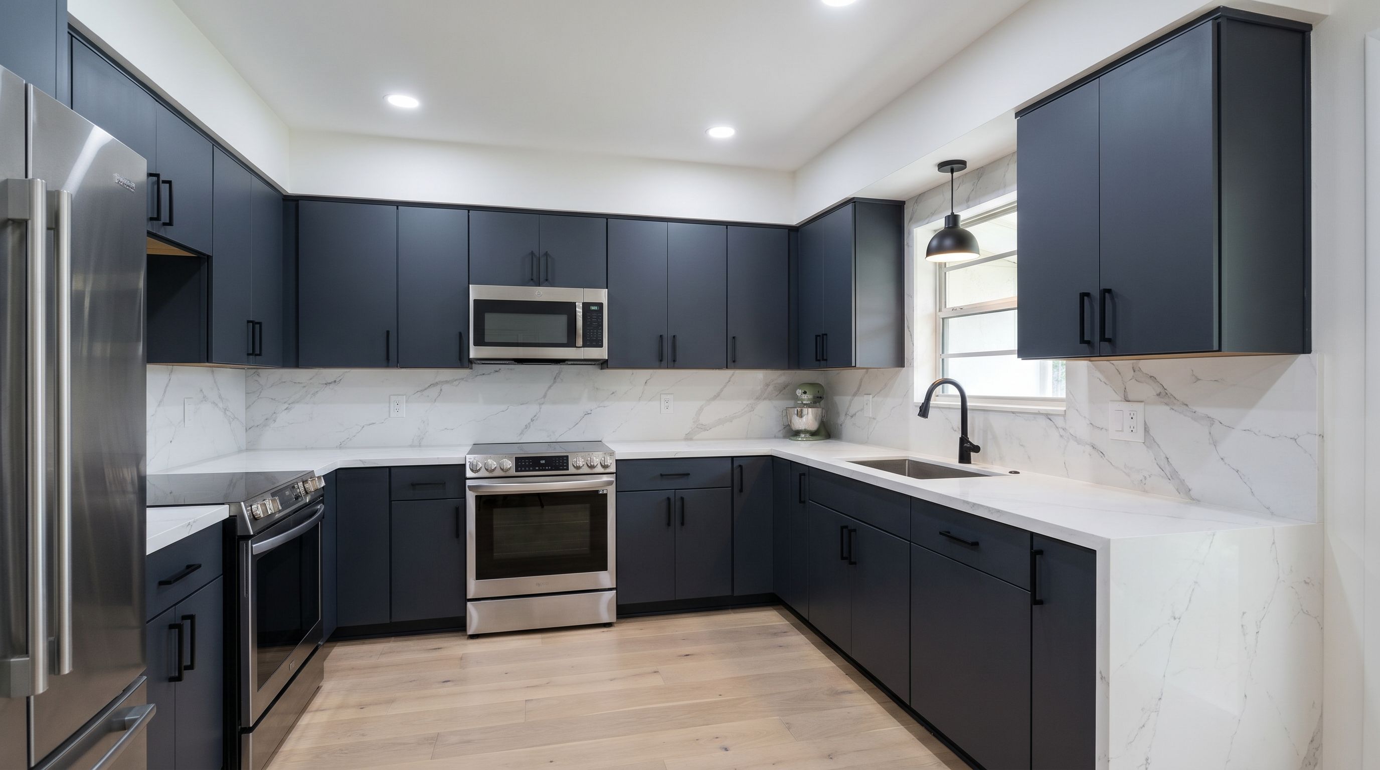 After Marble Waterfall Kitchen